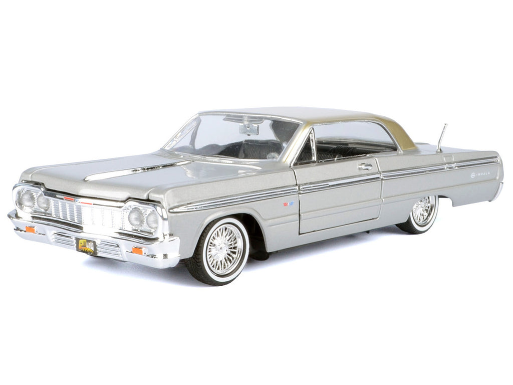 1964 Chevrolet Impala Lowrider Hard Top Silver Metallic with Gold Metallic Top "Get Low" Series 1/24 Diecast Model Car by Motormax-1
